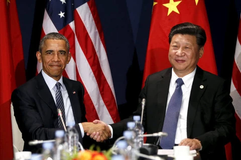 Chủ tịch Trung Quốc Tập Cận Bình hội đàm với người đồng cấp Mỹ Barack Obama. (Ảnh: Reuters)