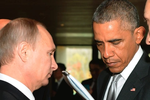 Tổng thống Nga Putin và người đồng cấp Mỹ Obama. (Ảnh: AFP)