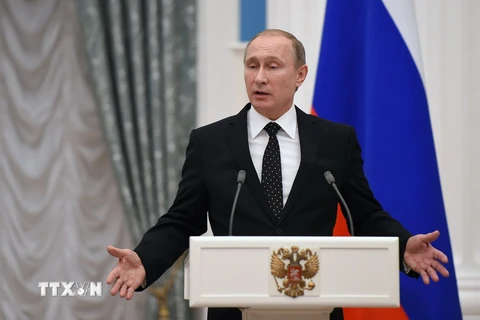 Tổng thống Nga Vladimir Putin phát biểu tại một cuộc họp báo ở thủ đô Moskva ngày 26/11. (Ảnh: AFP/TTXVN)