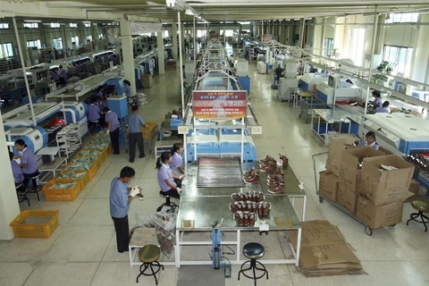 Công nhân Triều Tiên làm việc tại một nhà máy ở Khu công nghiệp chung Keasong. (Nguồn: koreatimesus.co)