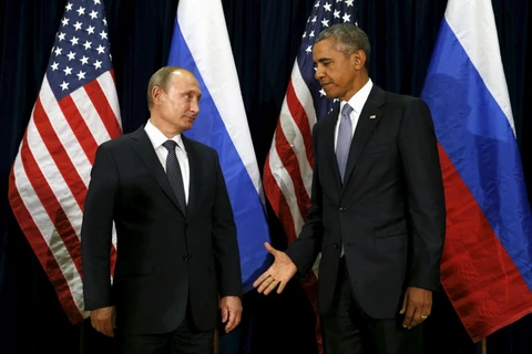 Tổng thống Nga Vladimir Putin và người đồng cấp Mỹ Barack Obama. (Nguồn: independent.co.uk) 