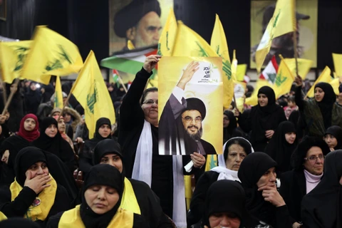 Những người ủng hộ phong trào Hezbollah. (Nguồn: Reuters)