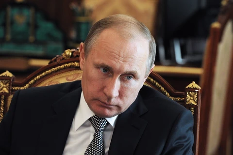 Tổng thống Vladimir Putin được coi là có quan hệ thân cận với hai quan chức đang bị truy nã quốc tế với cáo buộc rửa tiền và tội phạm có tổ chức. (Nguồn: TASS)