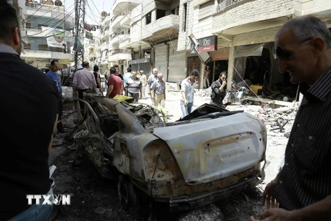 Hiện trường một vụ đánh bom liều chết ở Syria. (Nguồn: AFP/TTXVN)