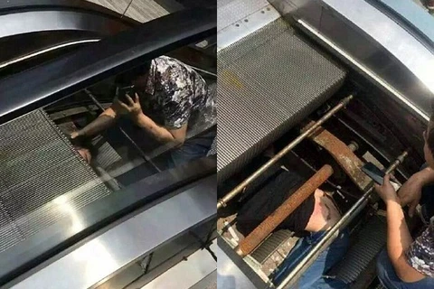 Người đàn ông bị cuốn vào trong thang máy, chỉ còn đầu hở ra ngoài.