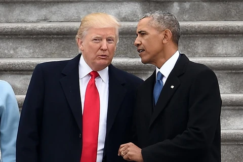 Tổng thống Mỹ Donald Trump và cựu Tổng thống Barack Obama. (Nguồn: AFP)