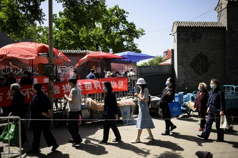 Trung Quốc thực hiện hạn chế đi lại tại các ổ dịch ở thành phố Cát Lâm. (Ảnh: AFP/TTXVN)