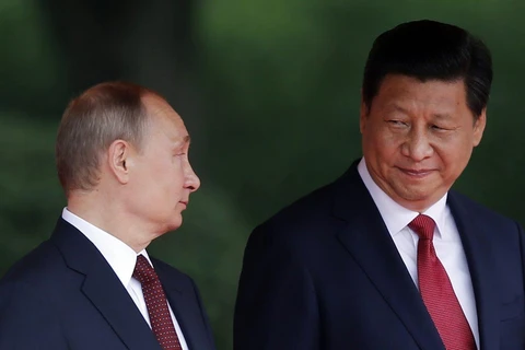 Tổng thống Nga Vladimir Putin và Chủ tịch Trung Quốc Tập Cận Bình. (Nguồn: AFP)