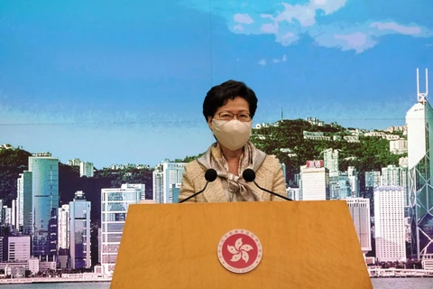 Trưởng Đặc khu hành chính Hong Kong (Trung Quốc) Lâm Trịnh Nguyệt Nga trong cuộc họp báo về “Luật bảo vệ an ninh quốc gia tại Đặc khu hành chính Hong Kong", ngày 30/6/2020. (Ảnh: THX/TTXVN)