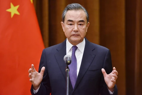 Ngoại trưởng Trung Quốc Vương Nghị phát biểu trong cuộc họp báo tại Bắc Kinh. (Ảnh: AFP/TTXVN)
