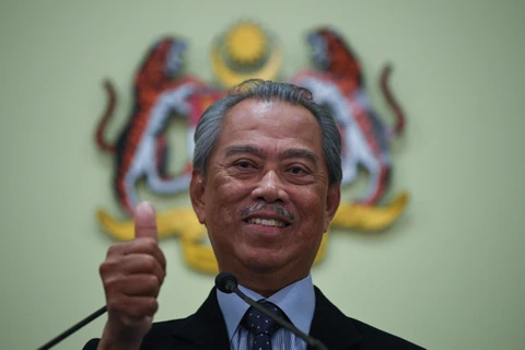 Thủ tướng Malaysia Muhyiddin Yassin phát biểu tại một cuộc họp ở Putrajaya ngày 9/3/2020. (Ảnh: AFP/TTXVN)