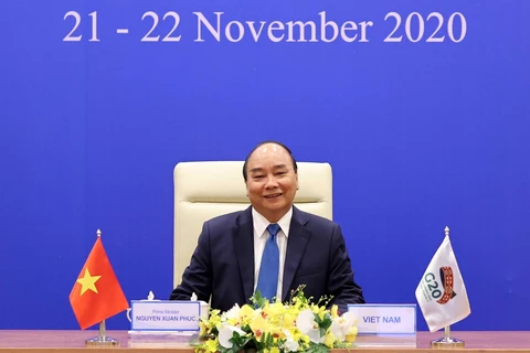 Thủ tướng Nguyễn Xuân Phúc phát biểu tại Hội nghị thượng đỉnh G20 trực tuyến. (Ảnh: Thống Nhất/TTXVN)