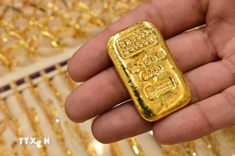 Giá vàng tại châu Á ổn định ở mức 1.727 USD trong phiên 26/3