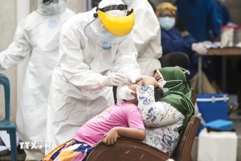 Indonesia ghi nhận ngày có số ca nhiễm mới SARS-CoV-2 cao kỷ lục