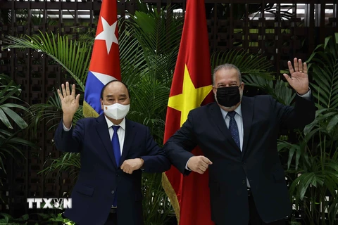 [Photo] Chủ tịch nước Nguyễn Xuân Phúc hội kiến Thủ tướng CH Cuba