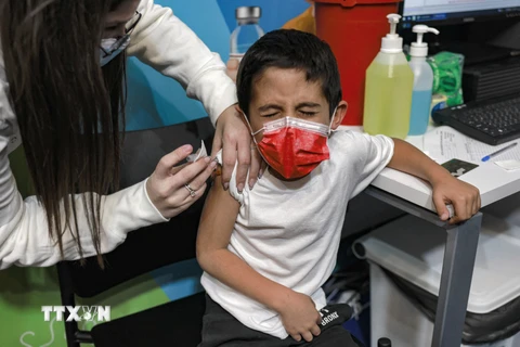 Đức khuyến nghị tiêm vaccine COVID-19 cho trẻ từ 5-11 tuổi có bệnh nền