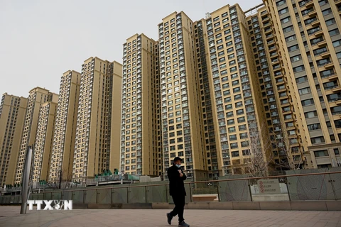 Fitch: Các công ty bất động sản Trung Quốc thiếu tiền mặt nghiêm trọng