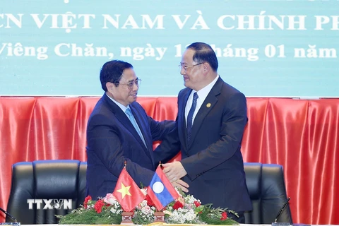 Việt Nam-Lào gìn giữ và làm sâu sắc hơn quan hệ đặc biệt giữa hai nước