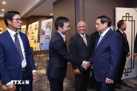 Thủ tướng Phạm Minh Chính gặp Hội doanh nghiệp Việt Nam tại Australia. (Ảnh: Dương Giang/TTXVN)