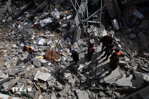 Cảnh đổ nát sau các cuộc không kích của Israel xuống Dải Gaza ngày 27/3/2024. (Ảnh: THX/TTXVN)