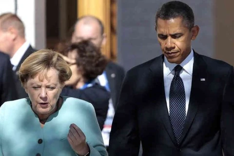 Tổng thống Mỹ Obama và Thủ tướng Đức Merkel. (Ảnh: presstv.ir)