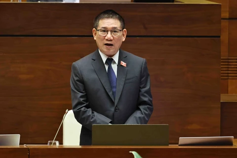 Bộ trưởng Bộ Tài chính Hồ Đức Phớc giải trình một số vấn đề liên quan tới nội dung Phê chuẩn quyết toán ngân sách nhà nước năm 2022. (Ảnh: TTXVN)