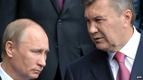 Tổng thống Nga (trái) và Ukraine trong cuộc gặp ngày 6/12 ở Sochi. (Nguồn: AFP)