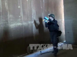 Thanh sát viên của OPCW làm việc tại Syria (Nguồn: AFP/TTXVN)