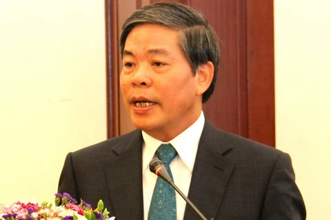 Bộ trưởng Nguyễn Minh Quang phát biểu tại hội thảo. (Ảnh: Hoàng Chương/Vietnam+)