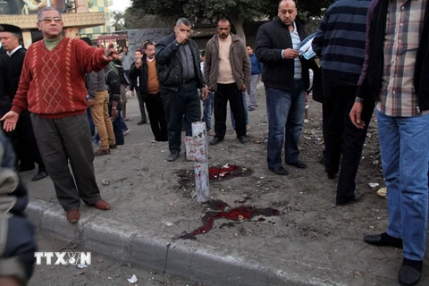 Hiện trường một vụ đánh bom ở Cairo. (Nguồn: AFP/TTXVN)