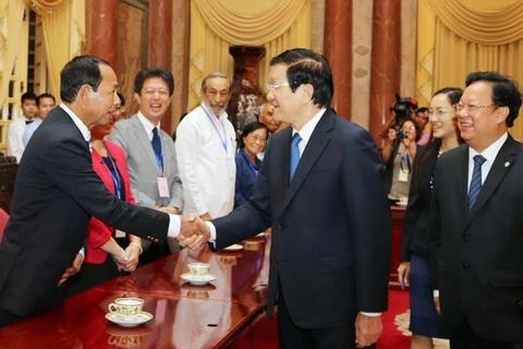 Chủ tịch nước Trương Tấn Sang với các đại biểu. (Ảnh: Nguyễn Khang/TTXVN)