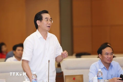 Ông Nguyễn Hữu Vạn, Tổng Kiểm toán Nhà nước trình bày tờ trình. (Ảnh: Phương Hoa/TTXVN)