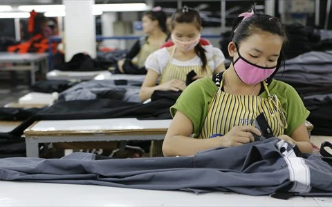 Lao động ở Lào. (Nguồn: CFP) 