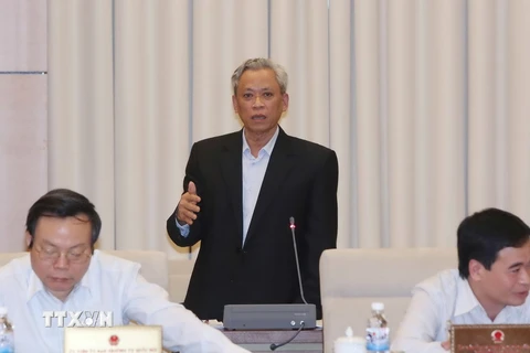 Phó Chủ nhiệm Ủy ban Pháp luật của Quốc hội Trần Đình Long phát biểu ý kiến. (Ảnh: Phương Hoa/TTXVN)