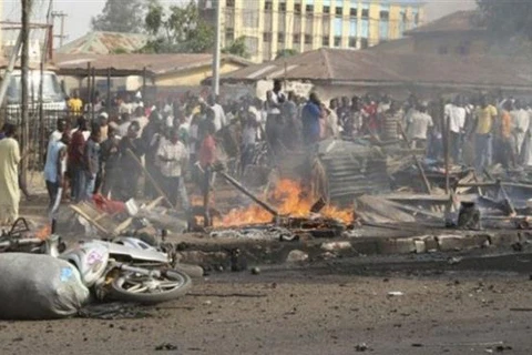 Hiện trường một vụ đánh bom ở Nigeria. (Nguồn: PressTV)
