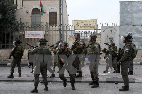 Lực lượng an ninh Israel được triển khai để đối phó với người biểu tình Palestine tại Bethlehem, Khu Bờ Tây ngày 13/10. (Nguồn: AFP/TTXVN)