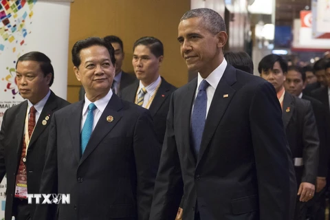 Thủ tướng Nguyễn Tấn Dũng (trái) và Tổng thống Mỹ Barack Obama (phải) tại Hội nghị Cấp cao ASEAN-Mỹ. (Nguồn: AFP/TTXVN)