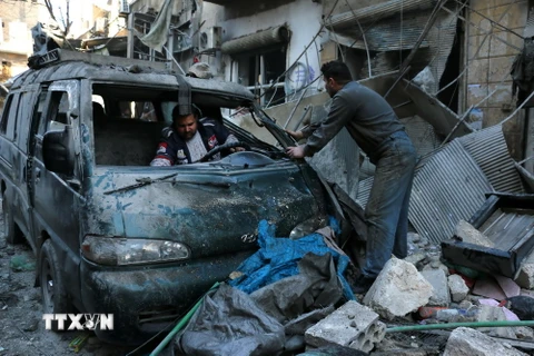 Cảnh đổ nát sau các cuộc giao tranh giữa quân đội chính phủ và phiến quân tại thành phố Aleppo, miền Nam Syria ngày 16/1. (Nguồn: AFP/TTXVN)
