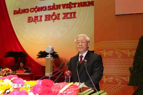 Tổng Bí thư Nguyễn Phú Trọng đọc Báo cáo của Ban Chấp hành Trung ương Đảng khóa XI về các văn kiện trình Đại hội XII của Đảng. (Ảnh: TTXVN)