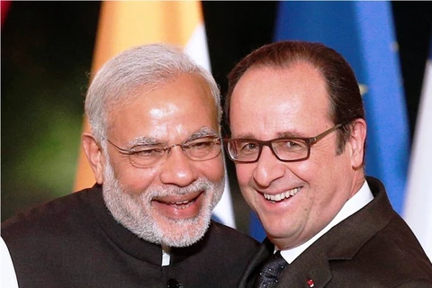 Tổng thống Pháp Francois Hollande (phải) và Thủ tướng Ấn Độ Narendra Modi. (Nguồn: Reuters)