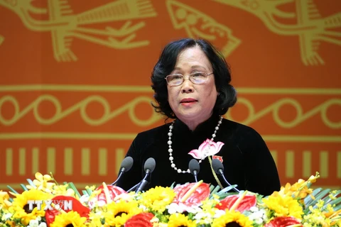 Đồng chí Phạm Thị Hải Chuyền, Ủy viên Trung ương Đảng, Bộ trưởng Bộ Lao động-Thương binh và Xã hội trình bày tham luận. (Ảnh: TTXVN)