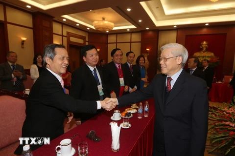 Tổng Bí thư Nguyễn Phú Trọng với các đại biểu. (Ảnh: Trí Dũng/TTXVN) 