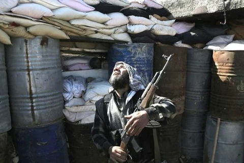 Một tay súng phe đối lập Syria. (Nguồn: AFP)