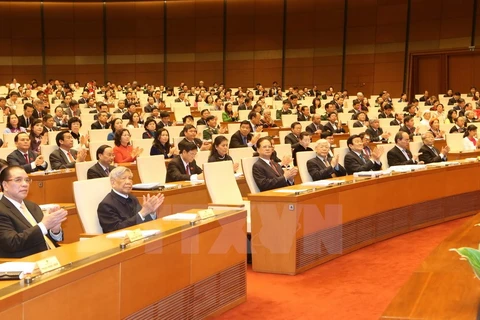 Các lãnh đạo, nguyên lãnh đạo Đảng và Nhà nước và các đại biểu tại phiên khai mạc. (Ảnh: Nhan Sáng/TTXVN)