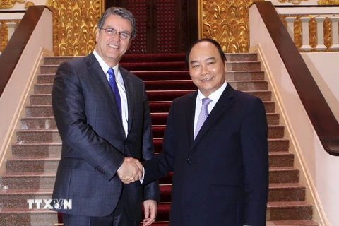 Thủ tướng Nguyễn Xuân Phúc tiếp ngài Roberto Azevedo, Tổng Giám đốc Tổ chức Thương mại Thế giới (WTO) đang thăm và làm việc tại Việt Nam. (Ảnh: Thống Nhất/TTXVN)