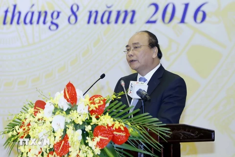 Thủ tướng Nguyễn Xuân Phúc phát biểu tại hội nghị. (Ảnh: An Đăng/TTXVN)