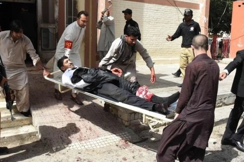 Người bị thương trong vụ đánh bom. (Nguồn: AFP)