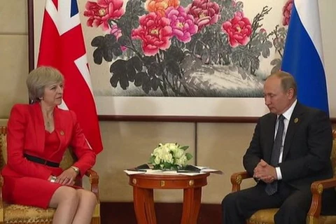 Thủ tướng Anh Theresa May và Tổng thống Nga Vladimir Putin. (Nguồn: BBC)