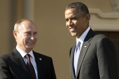 Tổng thống Nga Vladimir Putin và người đồng cấp Mỹ Barack Obama trong một cuộc gặp. (Nguồn: RT)