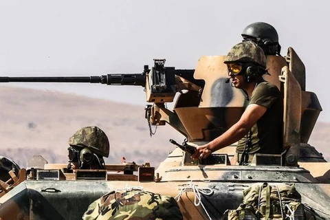 Xe tăng Thổ Nhĩ Kỳ tiến vào Syria. (Nguồn: AFP)